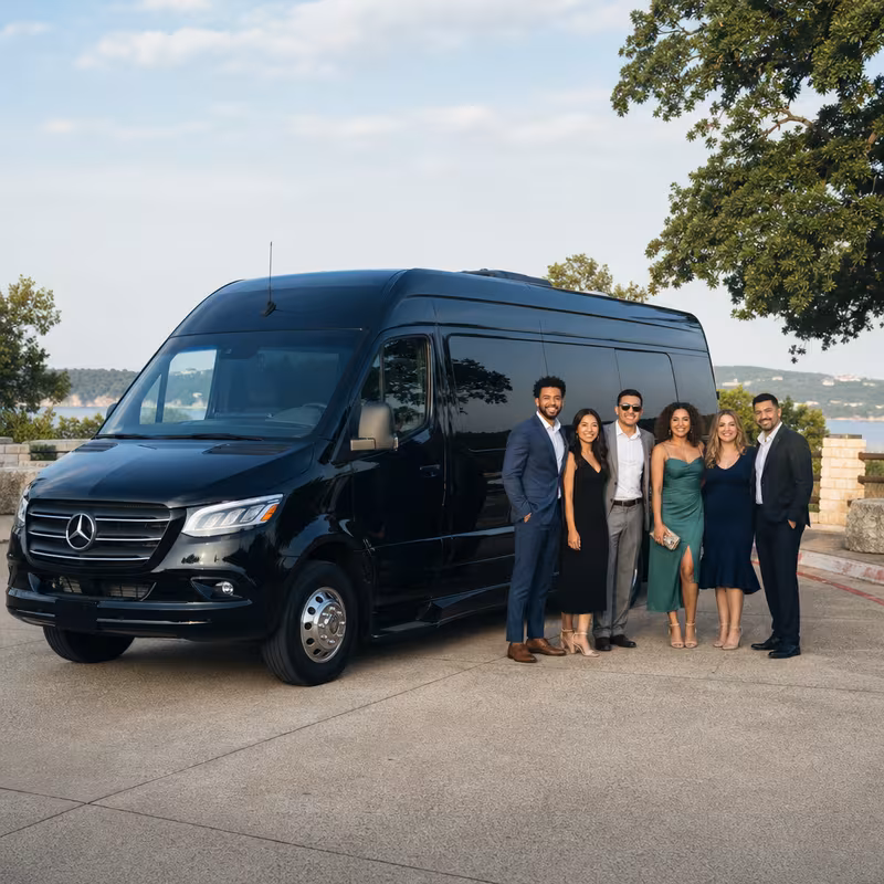 Group beside a Mercedes Sprinter limo from the Dallas fleet