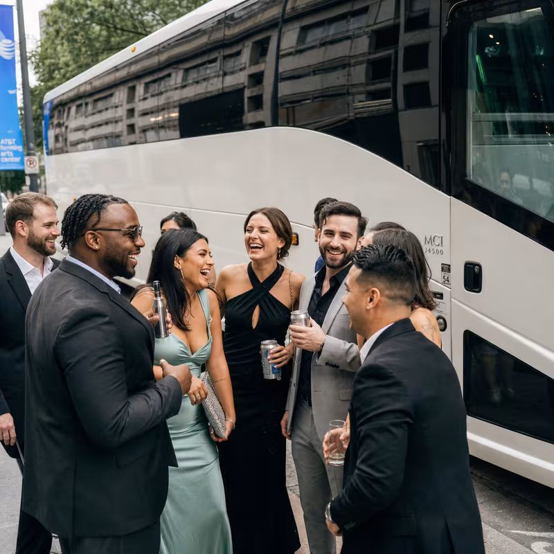 Passengers loading luggage while boarding an Dallas group shuttle